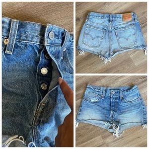 Levi's Light Blue Frayed Denim Shorts.